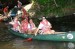 woman and children in canoe