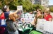 women at health fair booth