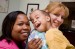 two women and child