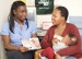 women and baby in doctor's office