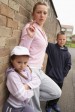mother smoking with children nearby