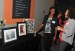 Photovoice student talks to CC Stephanie Rogers about her photos.