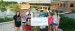 Teens and tweens of the fund raising group Cupcakes4Cancer presented $2,085 to Dr. John Strasser, representing the pediatric cancer program at the Helen F. Graham Cancer Center.