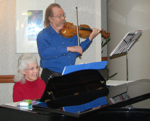 piano player and violin player