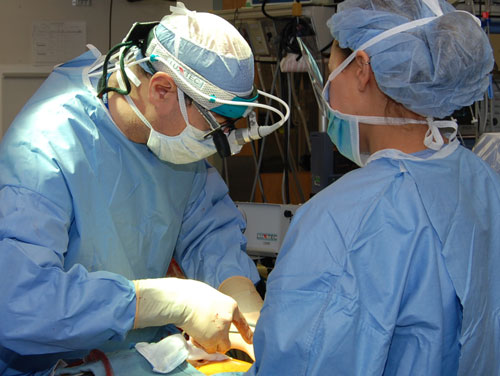 heart surgeons in operating room