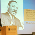 adewale troutman speaking at global health symposium