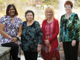 Renitia Pulliam, RN, patient Aurea Harden, Katie Alexander, RN, and Michele Johnson, RN