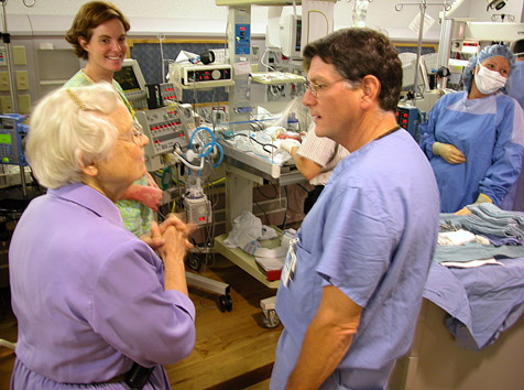 In 2002, Katherine Esterly, M.D., then chair of Pediatrics, and John Stefano, M.D., then director of Neonatology, discuss the conditions of the five Maris babies who were the first-ever quintuplets born in Delaware.