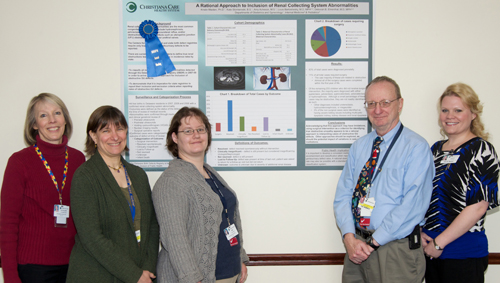 From left, Kathleen Stomieroski, program assistant; Deborah Ehrenthal, M.D., FACP, director of Health Services Research for Women and Children; Amy Acheson, program assistant; Louis Bartoshesky, M.D., chair, Department of Pediatrics; and Kristen Maiden, Ph.D., project manager.