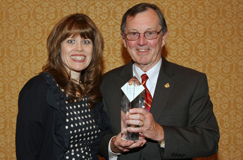 Timothy Gardner, M.D., receives the American Heart Association’s 2013 Gold Heart Award from Nancy Brown, CEO of the American Heart Association.