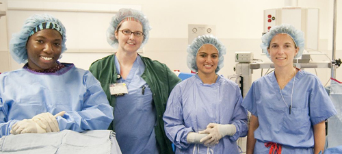 In its 2013 Best Hospital edition, U.S. News & World Report places Christiana Care’s Department of Obstetrics and Gynecology among the top 50 hospitals nationwide in the specialty of gynecology. Pictured in the OR are Amy A. Hamlet, surgical technologist; Lindzey N. Jones, RN, CNOR; Neha Vora, M.D., OB-GYN resident resident; and Gretchen Makai, M.D., director of minimally-invasive gynecologic surgery for Christiana Care’s Department of Obstetrics and Gynecology. 