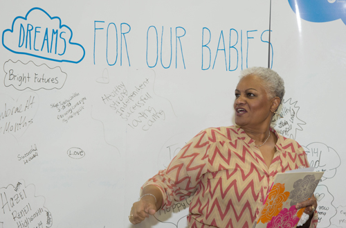 Denise Scales, MSN, RN, manager of Parent Education at Christiana Care Health System, leads a discussion with mom-to-be about hopes and dreams for their babies at the Community Baby Shower.