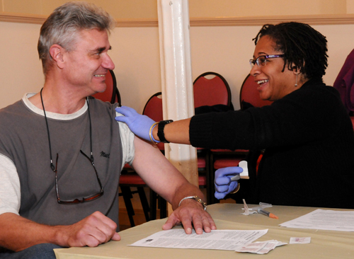 The Thanksgiving meal was an opportunity for some of the city's homeless to receive flu shots and blood-pressure screenings from Christiana Care nurses.