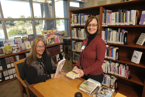 Georgia Jones and librarian Ellen Justice chat during one of Jones' many visits to the Junior Board Cancer Resource Library at the Helen F. Graham Cancer Center and Research Institute. Christiana Care operates three community health libraries that are open to the public.