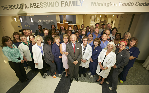 Rocco Abessinio joins physicians, nurses and staff of the newly opened Rocco A. Abessinio Family Wilmington Health Center to celebrate the transformation of Christiana Care's primary care and outpatient specialty practices at Wilmington Hospital.