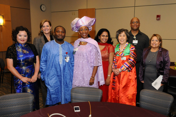 Many graduates of the Language Interpreters Network of Christiana Care (LINCC) dressed in clothing reflecting their cultures of origin at the graduation ceremony.