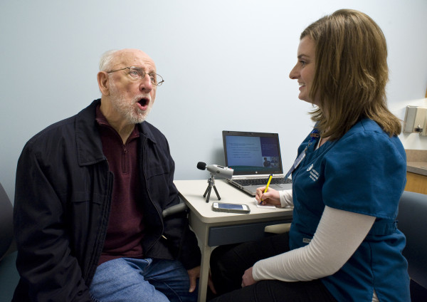 A speech therapy patient and coach at University of Delaware STAR Campus site.