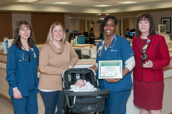 First-time mom and fellow nurse Allison Steuber, MSN, RN III, CEN, thanked postpartum unit nurse Keisha Bourne, BSN, RN, for her exceptional care by nominating her for a DAISY Award, an honor recognizing extraordinary nurses.  