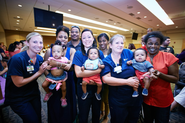 NICU nurses catch up with the Judge Family and their triplets, who joined the fun at the NICU reunion.