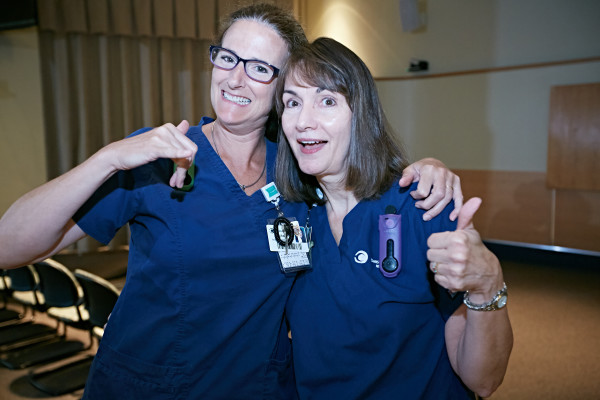 Nurses at Wilmington Hospital give the thumbs-up sign after hearing the good news.