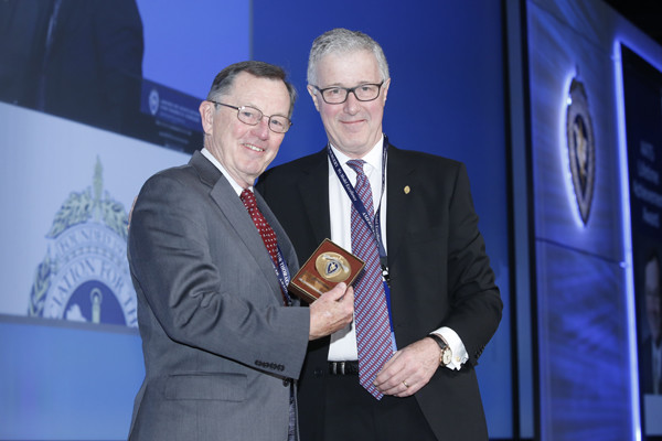 Timothy J. Gardner, M.D. (left), medical director of Christiana Care’s Center for Heart & Vascular Health, received a lifetime achievement award from the American Association for Thoracic Surgery, presented by former AATS President G. Alexander Patterson, M.D.