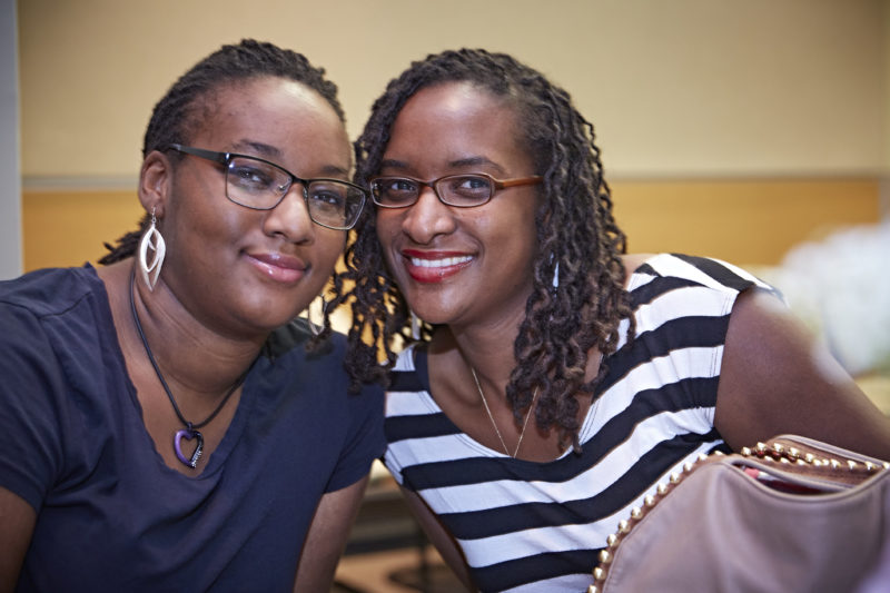 Elizabeth Harper (left) has learned about good nutrition and heart-healthy cooking techniques that she has shared with her mother, Nakeya Martin (right).